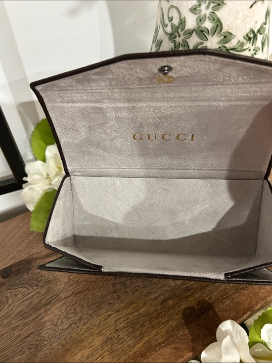 Gucci Brown Embossed GG Continental Case